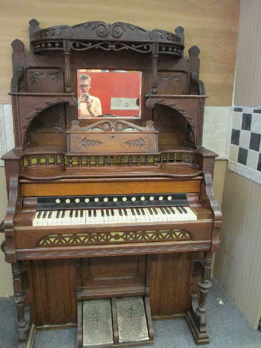 Parlor Pump Organ- Excellent Condition. Includes Original Stool, Book, Manuel and Picture of Original Owner. Pretty Sweet! Priced to move at $550 or best offer.