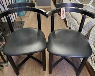 7023: Two Leather Cushion Black chairs with back supports
Two Leather Cushion Black chairs with back supports