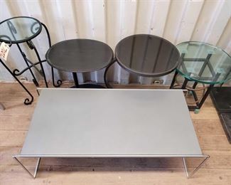 7027:Four Side tables and A Coffee Table
Three side tables have removeable glass tops. Coffee table is metal with removable side legs