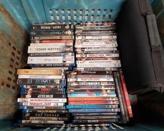 7402:
Tote of DVDs and TV series on Disc with a folder full of Discs
Tote of DVDs and TV series on Disc with a folder full of Discs