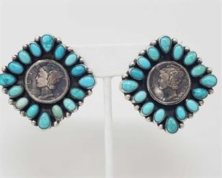 162: Artist Marked Amazing Pair of Sterling Silver and Turquoise Earrings with Authentic Mercury Dimes
These Beautiful Handmade Native American Earrings from the Famous Paul Livingston are made with Authentic Mercury Dimes in VG condition.. Complete with Turquoise Stones and set in Think Sterling Silver!!!
Weighs approx 29.4g
Low Estimate: 500.00
High Estimate: 750.00