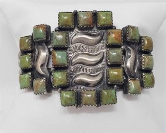 166:Artist Marked Native American Sterling Silver and Green Turquoise Cuff Bracelet, 54g
Artist Marked Sterling Silver and Green Turquoise Cuff Bracelet
Weighs approx 54g