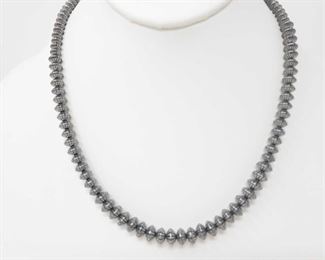 172: Handmade Native American Sterling Silver Pawn Bead Necklace
Handmade Native American Sterling Silver Pawn Bead Necklace
Weighs approx 29.7g Measures approx 18.5"