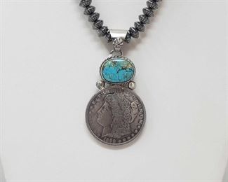 174: Beautiful Artist Marked Sterling Pendent with a Authentic Morgan Silver Dollar (chain not included)
Beautiful Artist Marked Sterling Pendent with a Authentic Morgan Silver Dollar (chain not included)
Chain not included Weighs approx 38.6g Measures approx 2.5"