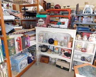 We ran out of room on the walls, and had to setup shelves in the center of the RV garage. It is busting at the seams!