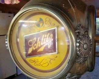 Rotating, Lighted Schlitz sign. My Grandparents used to drink this beer. I snuck a few. Don't tell my Mommy.