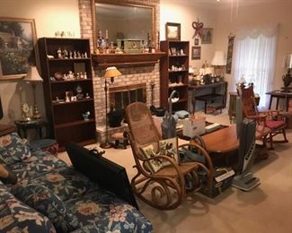 Blue Flowered Couch, Kirby and Oreck Vacuums, Antique Floor Lamp,