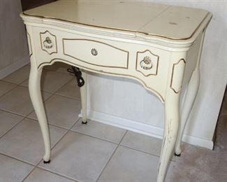 French Provincial style cabinet with Singer sewing machine