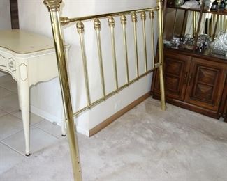 Brass tone headboard