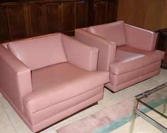 Pair of vintage 1980s club chairs upholstered in mauve vinyl