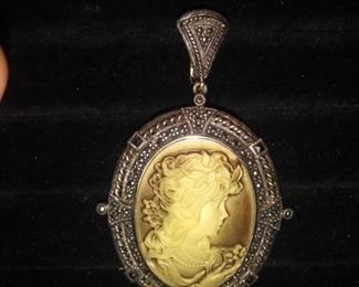 Sterling on leather necklace. New in box