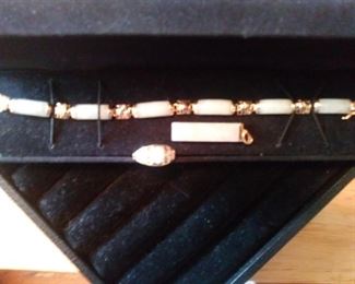 14K and jade bracelet, ring, and pendant.