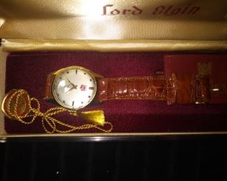 14K Buick retirement watch from the 1960s. Watch is a 23 jewel Lord Elgin with original box and book. Very rare ! Works great.

