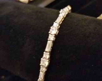 14K white golf bracelet with CZ's.