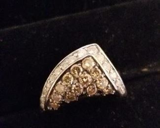 14K with chocolate and white diamonds.