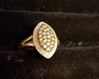 14K with chocolate and white diamonds.