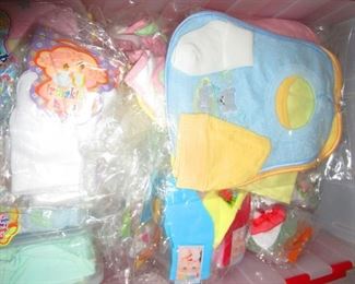 Baby bibs and clothes imported from Peru. New in wrappers. Pimo cotton