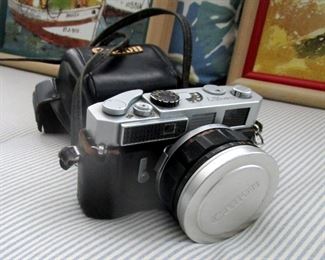 Canon 35 MM reflex camera. Giant macro lens