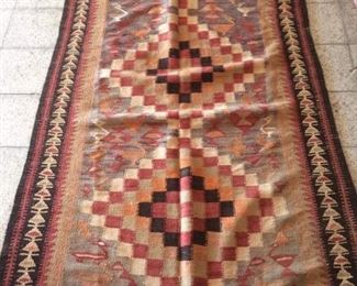 This new Persian Kilim has been made in the city of Seneh. Made with 100% natural wool, vegetable dyed and knotted by hand. This fine quality Kilim is one of the kind.
