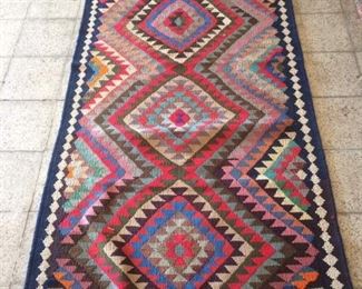 This new Persian Kilim has been made in the city of Seneh. Made with 100% natural wool, vegetable dyed and knotted by hand. This fine quality Kilim is one of the kind.