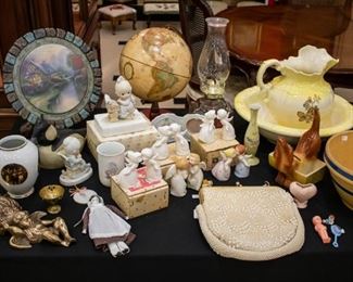 A globe, Precious Moments, Kissing Angels, oil lamp, vintage purse, pitcher & bowl, and more!