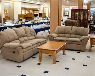 This microfiber couch and love seat both have recliners are both ends. The coffee and end table match and in great condition.