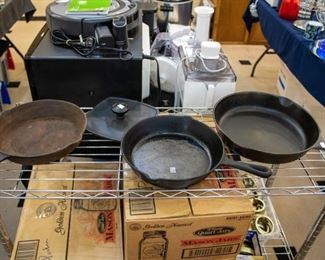 Cast Iron Skillets, Boxes of Mason Jars