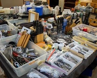 Lots of silverware, knives, kitchen gadgets, utensils, etc.