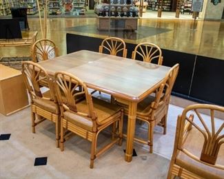 This is such a great, functional set! Absolutely in like new condition. The top is a laminate, the seats are vinyl, so it would be great for an every day family dining set. We have two extra arm chairs for purchase, if you need 8!