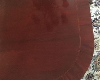 DETAIL OF BANDED MAHOGANY, DINING TABLE