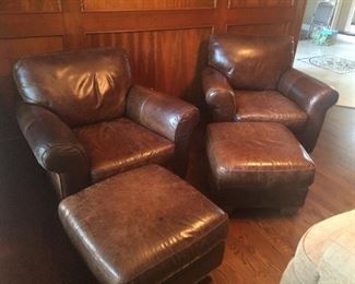 PAIR OF LEATHER CHAIRS & OTTOMANS BY EDITIONS