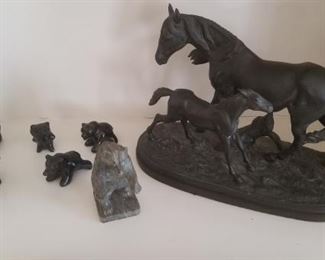 Bronze horses and eskimo carvings