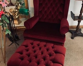 Burgundy wing back chair with matching ottoman