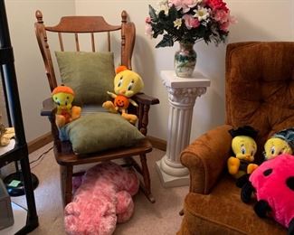 Would rocking chair, stuffed animals, plant stand