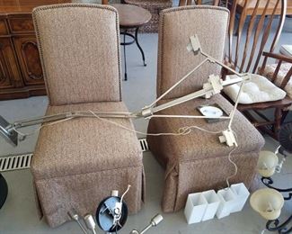 Pair of parson/slipper chairs. Very unique chandelier (glass light covers are the square pieces on the floor)