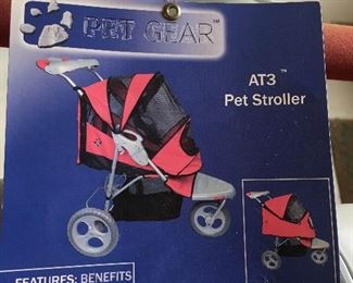 PET STROLLER YES A PET STROLLER!  Pamper your pooch with this easy to manuever ride.....