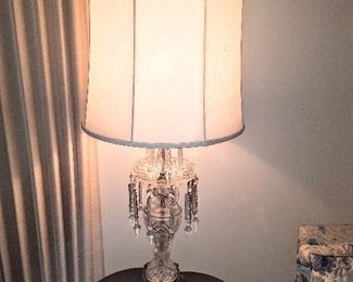 Beautifil paired gorgeous crystal lamps on top of lamp tables