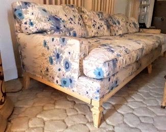 Close-up of 1960's sofa with is pretty blue & white floral "Spring-Time" upholstery.