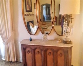 Lovely 3-Guilded Gold frame Mirror hanging above lovely marble-top console.