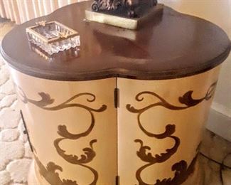 Close-up view of paired lamp tables.