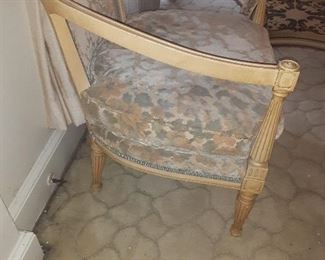 Side view of paired chairs.