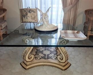 Beautiful unique square  glass top coffee  table and its gorgeous curved legs.