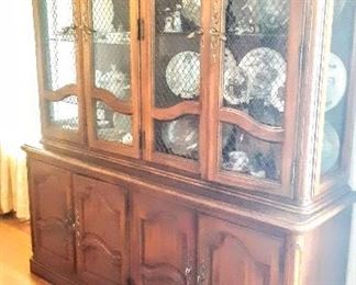Matching China Cabinet, lights up, abundant storage.