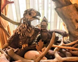 Featuring baby eagles in nest.