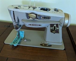 $50  Singer sewing machine & cabinet