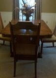 Huge Dining Room Table & 8 cane back upholstered chairs
