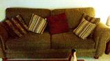 Large Upholstered Couch with lots of pillows