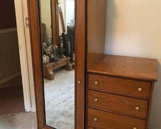 Antique wardrobe with attached dresser this thing is cool. I'm inventing reasons in my head why I need this.