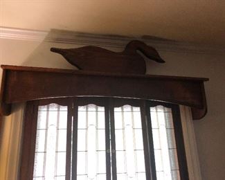 Wooden swan and window valance what home is complete without this?