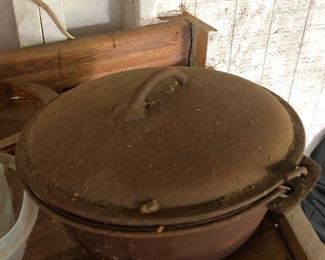 Old iron pot with lid let's live outside and cook varmints in this!